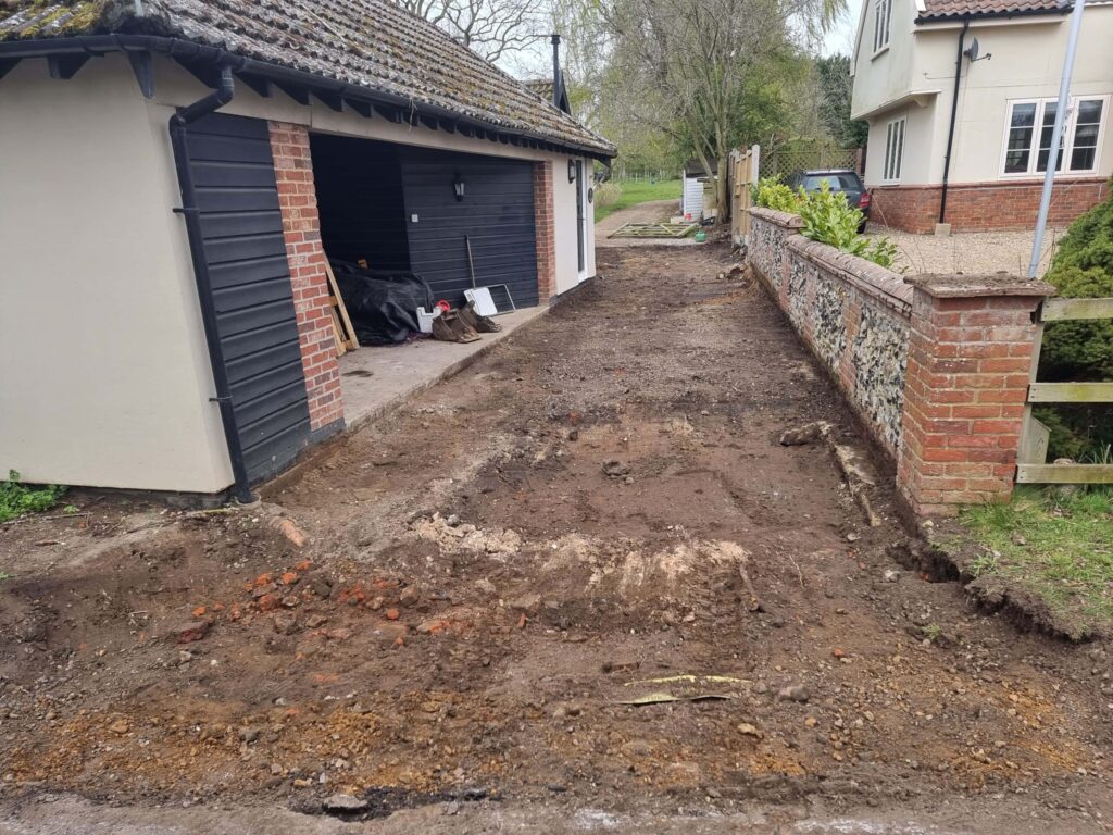 This is a tarmac driveway that is in the process of being dug out and installed by Attleborough Driveway Services